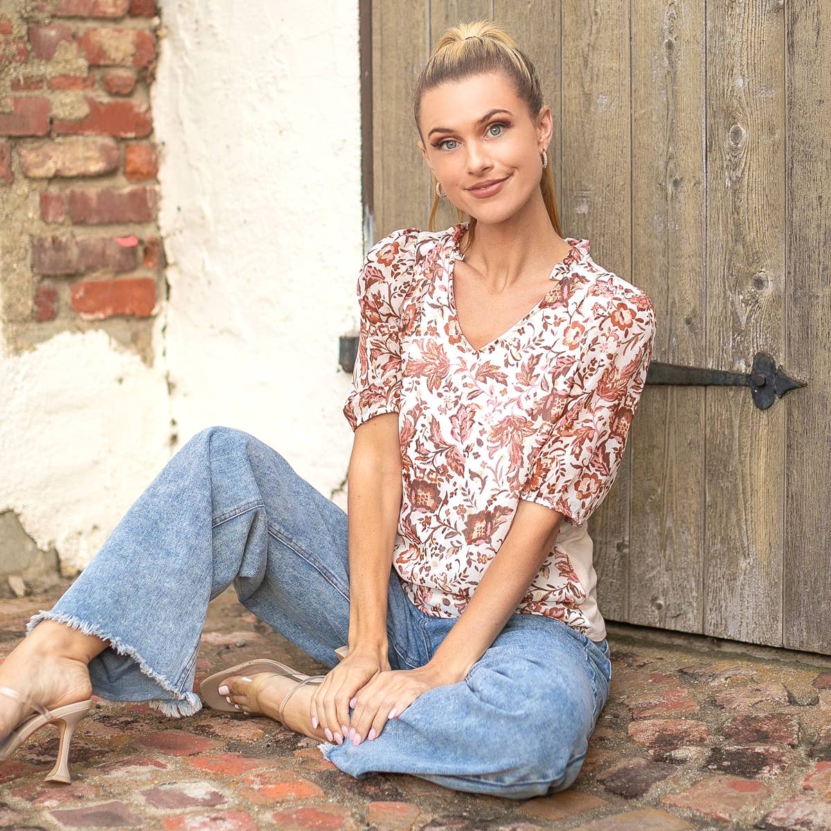 Ruffled V necked Floral Printed Top with Solid Back Detail