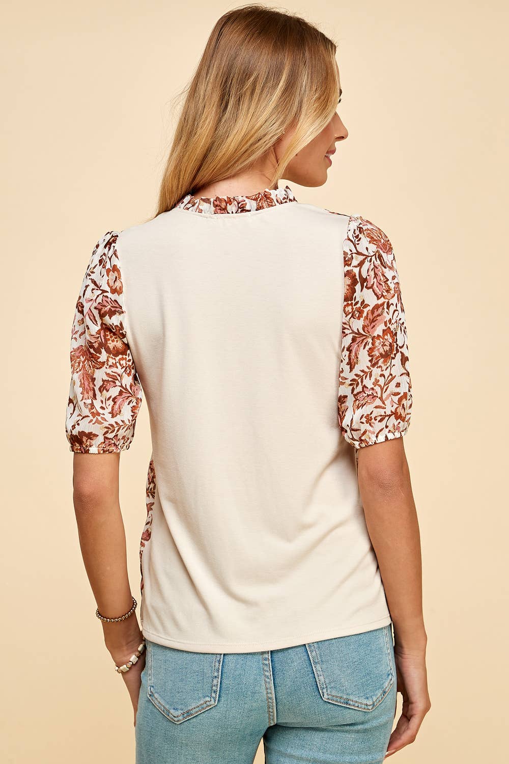 Ruffled V necked Floral Printed Top with Solid Back Detail