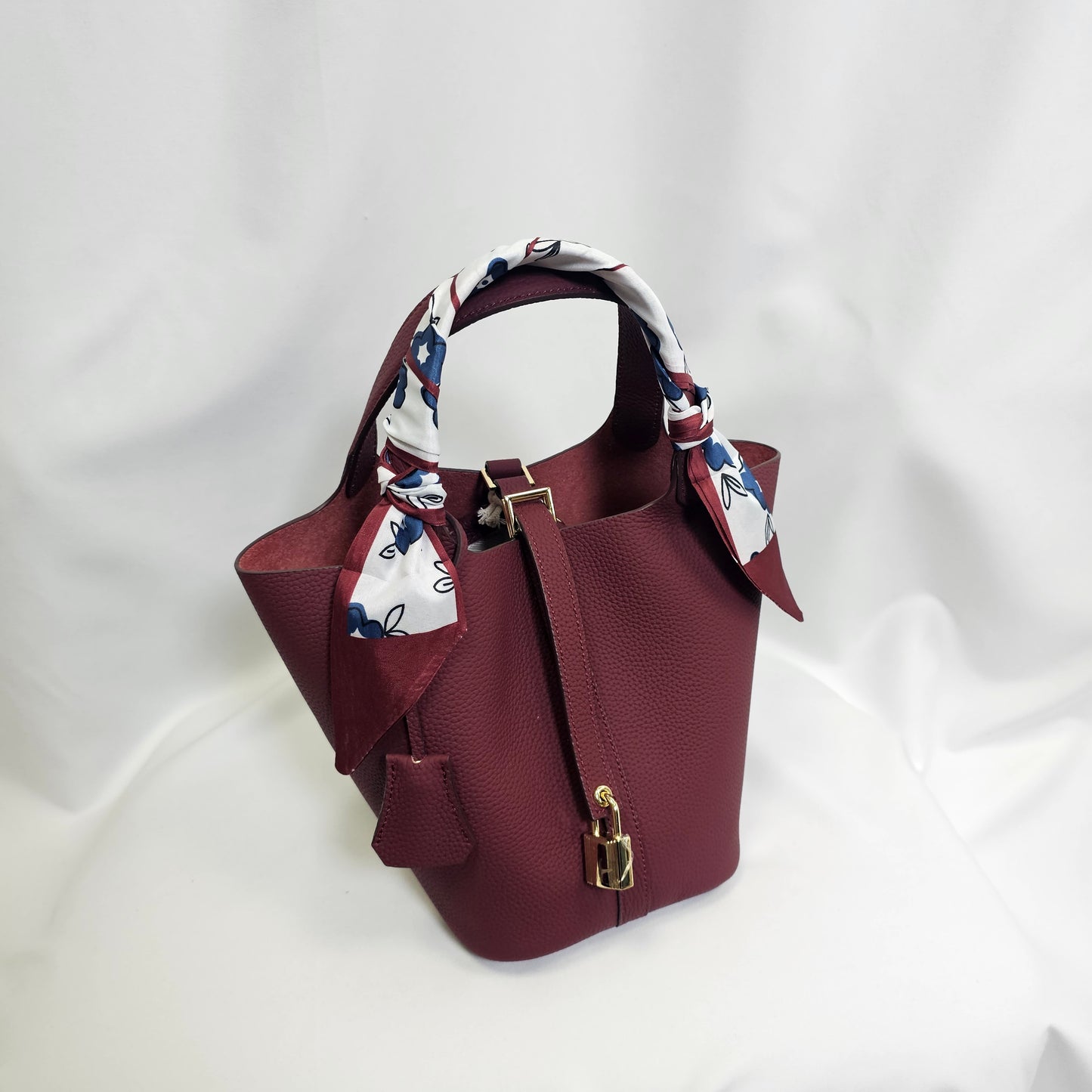 Leather Bucket Bag with Lock Design